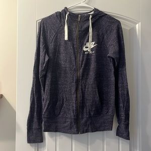 Like new Nike zip up sweater. Size Small.